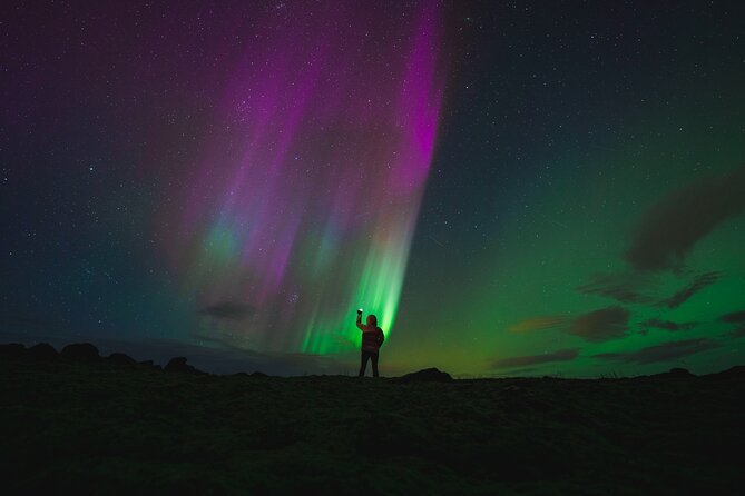 From Reykjavík: Evening Lava Tunnel Tour and Northern Lights Tour - Free photos and a warm cup under the stars
