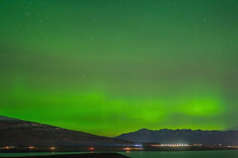 From Reykjavik: Northern Lights Guided Tour with Photos - Waiting under Icelandic stars