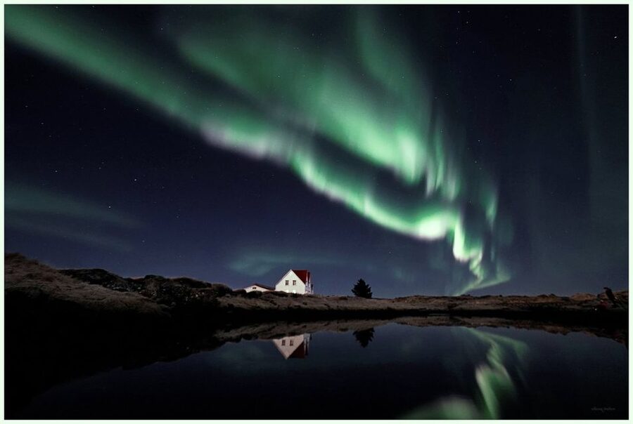 From Reykjavík: Northern Lights Tour with Hot Cocoa & Photos - Finding a clear patch of Icelandic sky