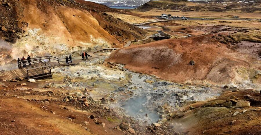 From Reykjavik: Reykjanes Geopark Tour & Airport Transfer - The minibus pickup and first stop at Hafnarfjörður