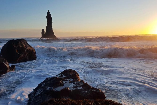 Golden Circle & South Coast. Private Day Tour - Skogafoss finishes the day with spray and rainbows