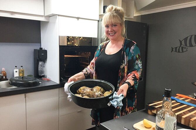 Icelandic Cooking Class in Downtown Reykjavik with Musical Hosts - Preparing two dishes in the open kitchen
