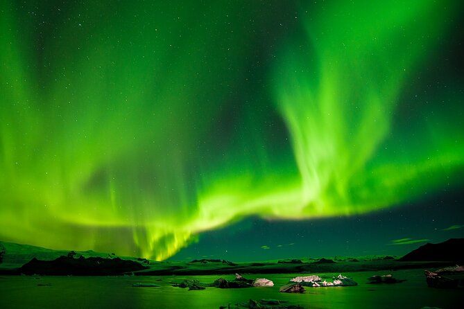 Northern Lights Boat Cruise from Reykjavik - Leaving Reykjavík’s Old Harbour after dark