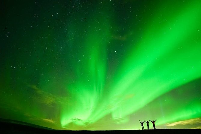 Northern Lights Minibus Tour with Hot Cocoa, Blankets & Photos - Leaving Reykjavik for darker skies