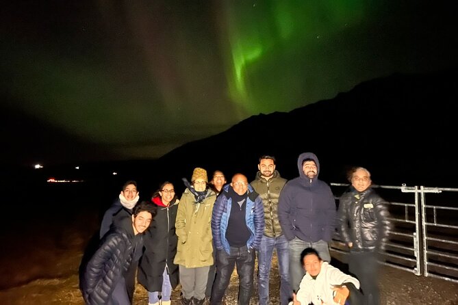 Northern Lights Private Guided Tour With Professional Photos - Hot chocolate, cinnamon rolls, and the cold