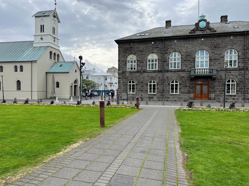 Reykjavik: City Walking tour in Small Group with Local Guide - Weather, pace, and accessibility