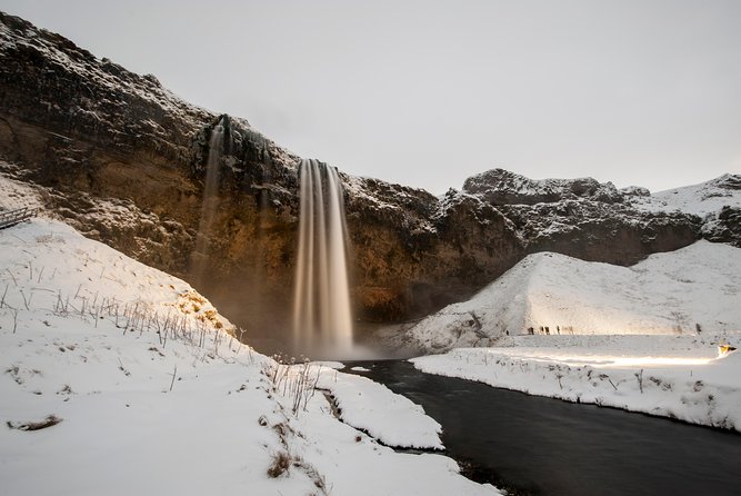 Reykjavik: Glacier Lagoon, Diamond Beach & South Coast Day Tour - Vík brings food, facilities, and black sand