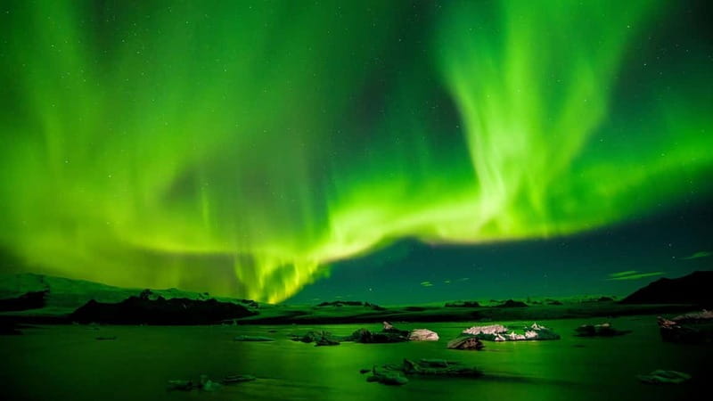 Reykjavik: Northern Lights Adventure Tour with Hot Chocolate - Leaving Reykjavik’s city glow behind