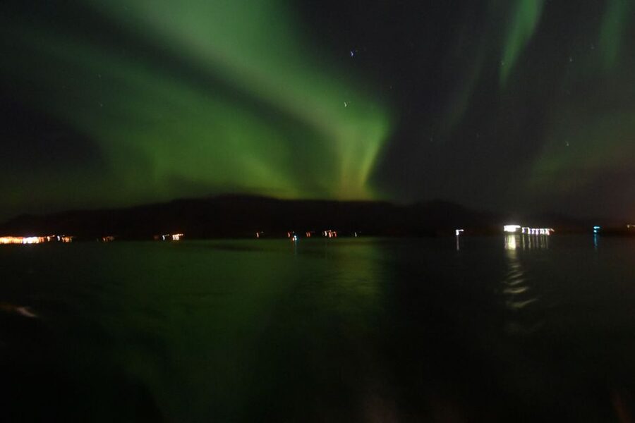 Reykjavik: Northern Lights Guided Boat Tour - Leaving Reykjavik Old Harbour after dark