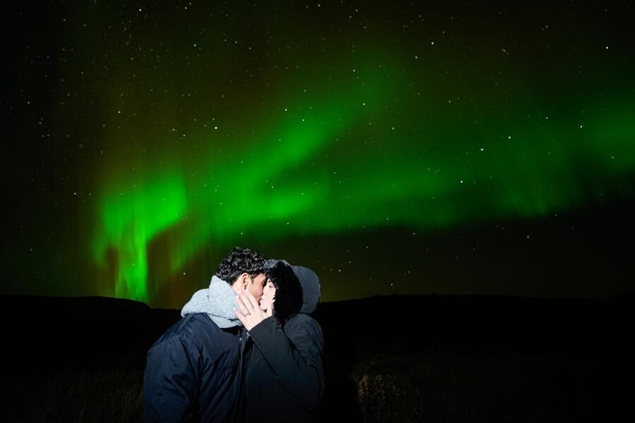 Reykjavik: Northern Lights Tour with Private Photographer - Pickup, clothing, and evening planning