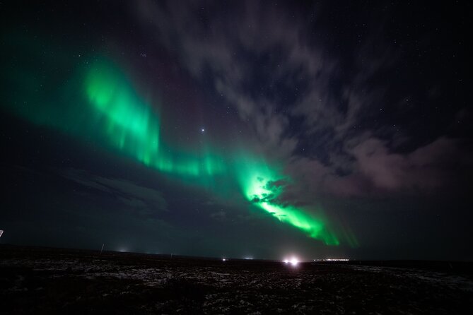 Reykjavik Northern Lights Tour with Professional Photographer - Booking, weather, and cancellation details