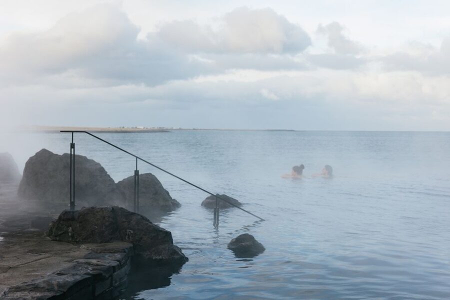 Reykjavik: Sky Lagoon Admission with Transfer - The pool, swim-up bar, and daily rhythm
