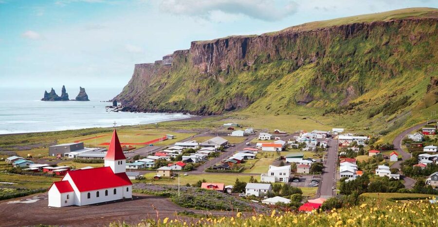 Reykjavik: South Coast Waterfalls & Glacier Small-Group Tour - Skógafoss, the South Coast’s great curtain of water