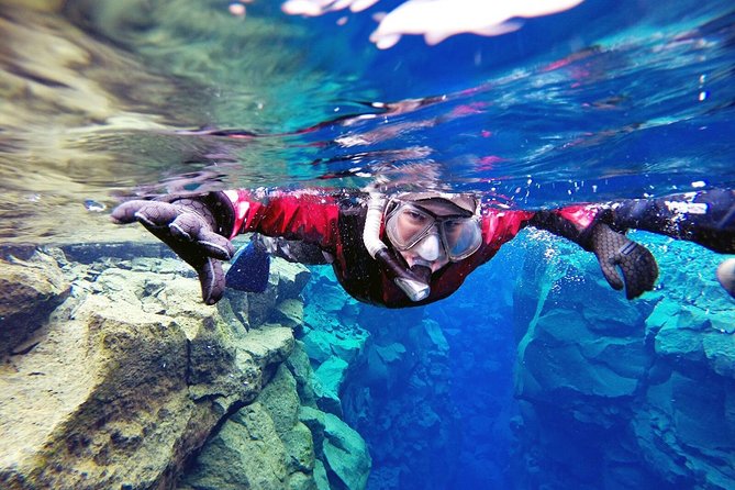 Silfra Drysuit Snorkeling Tour with Free Photos - From Reykjavik - The walk out, hot chocolate, and the coldest part