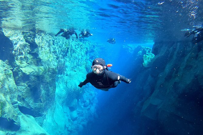Silfra Wetsuit Snorkeling Tour with Underwater Photos - From Reykjavik - Getting into the gear takes patience