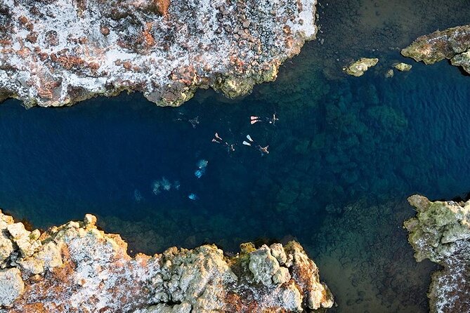 Snorkel the Silfra Fissure-Meet on Location (Free Photos & Cocoa) - What the guide adds to the experience