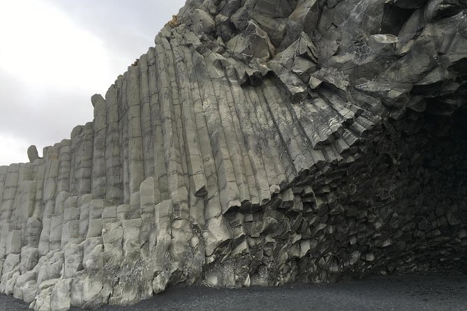 South Coast Small-Group Tour from Reykjavík - Sólheimajökull shows a glacier up close